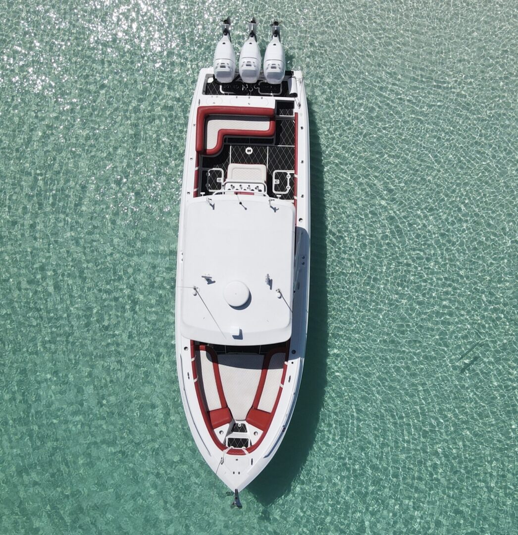A boat is shown from above in the water.